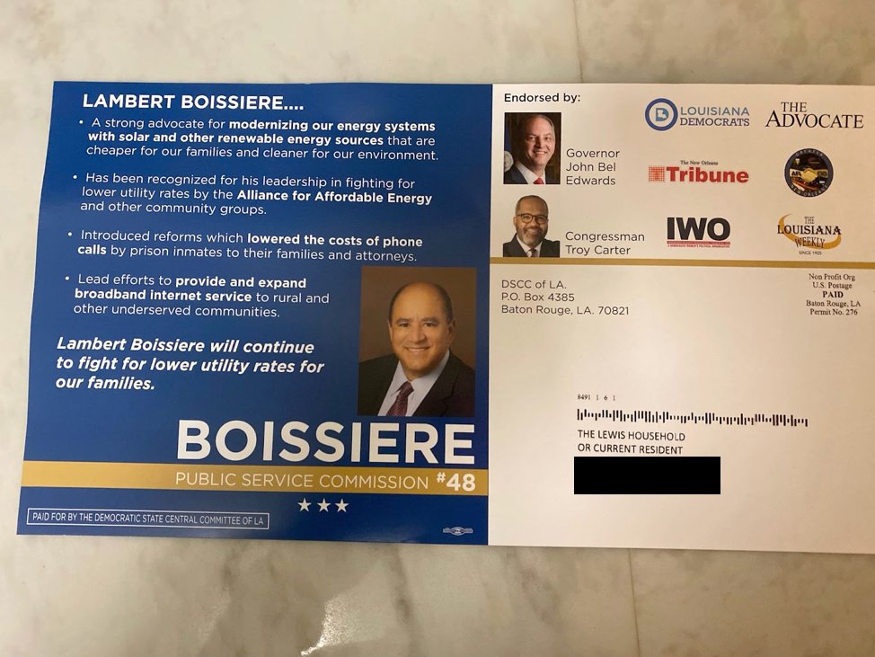 A blue and white rectangular mailer endorsing incumbent Lambert Boissiere III for Louisiana Public Service Commission, paid for by the state Democratic Party.