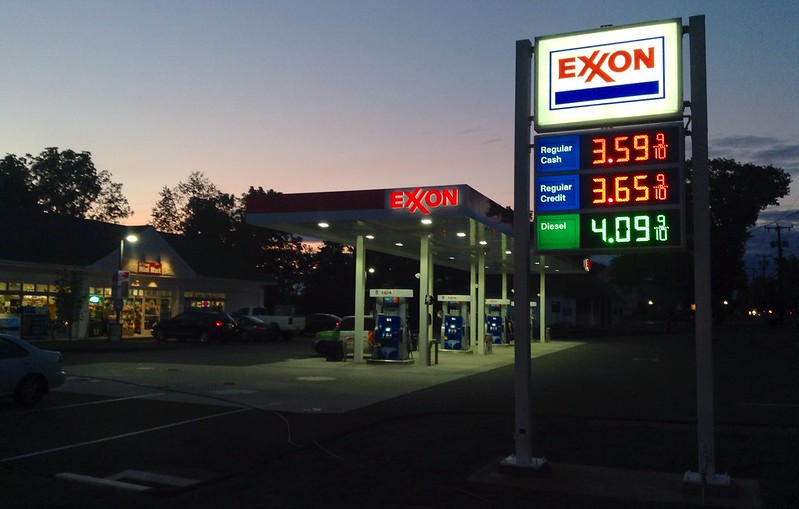 An Exxon gas station in low light