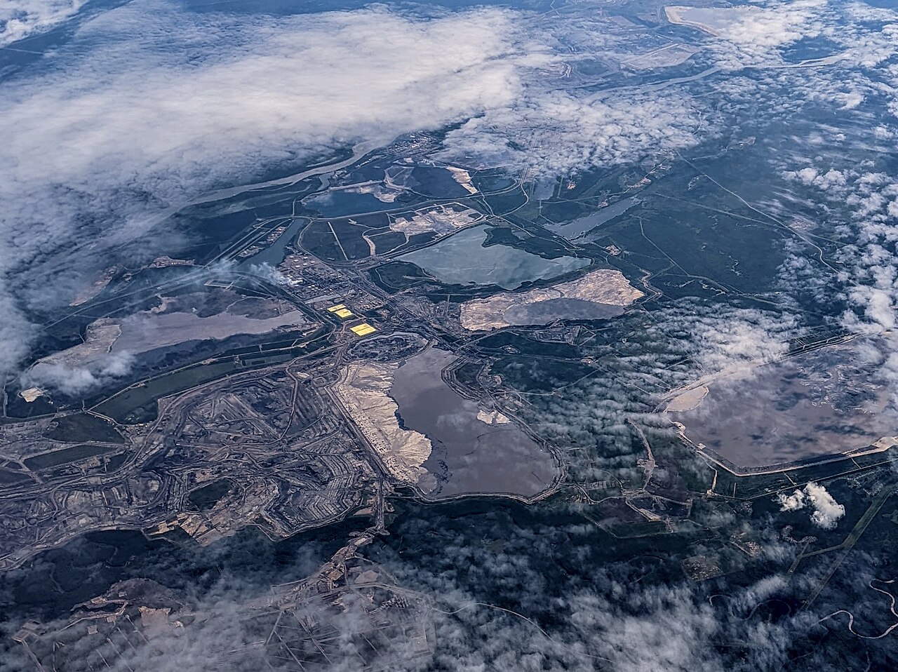 Aerial view of a Syncrude oil sands mine and tailings dam in northeastern Alberta.