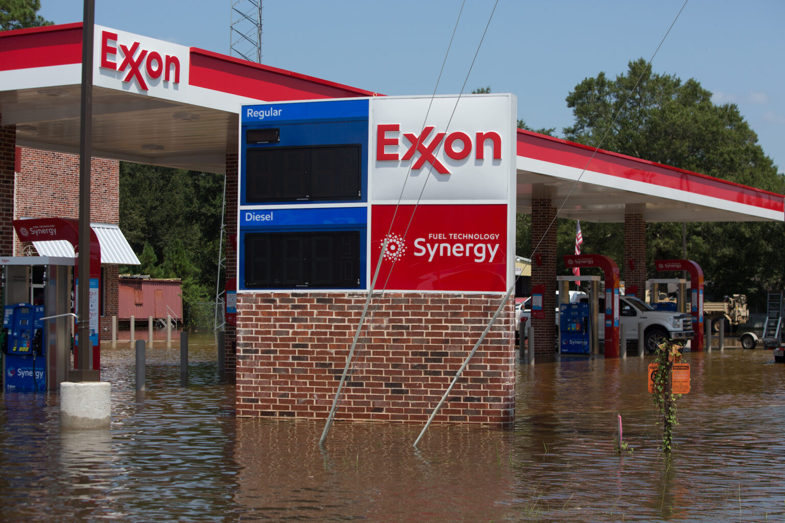 Hurricane Harvey, downgraded to a tropical storm when it flooded Vidor, Texas, flooded an Exxon gas station, Sept. 1, 2017.